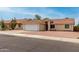 Attractive home boasting a clean facade, attached garage, and easy access street at 6416 S 19Th Pl, Phoenix, AZ 85042