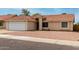Single-story home featuring an attached garage and well-kept desert landscaping at 6416 S 19Th Pl, Phoenix, AZ 85042