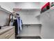 Organized walk-in closet featuring ample shelving space for clothes and accessories at 8712 W Sequoia Dr, Peoria, AZ 85382