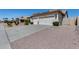 Single-story home with a desert-style front yard, tile roof, and three-car garage at 8712 W Sequoia Dr, Peoria, AZ 85382