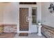 Close-up of a charming front door with decorative features and a well-kept entrance at 8712 W Sequoia Dr, Peoria, AZ 85382