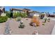 Front yard featuring desert landscaping with gravel, rocks, and various plants at 8712 W Sequoia Dr, Peoria, AZ 85382