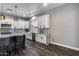 Modern kitchen featuring custom cabinets, stone countertops, and stainless steel appliances at 8712 W Sequoia Dr, Peoria, AZ 85382