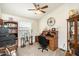 Home office with built in bookcases and decorative accents at 9333 E University Dr # 194, Mesa, AZ 85207