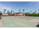Enjoy outdoor activities with these well-maintained shuffleboard courts surrounded by lush landscaping at 9333 E University Dr # 194, Mesa, AZ 85207