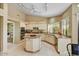 Gourmet kitchen features granite countertops, stainless steel appliances, and center island perfect for entertaining at 9717 W Marco Polo Rd, Peoria, AZ 85382