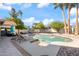 Backyard pool area with lounge chairs, pergola, lots of greenery and blue skies at 10248 E San Salvador Dr, Scottsdale, AZ 85258