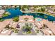 Aerial view of upscale waterfront homes featuring lush landscaping, swimming pools and private docks at 10390 E Lakeview Dr # 204, Scottsdale, AZ 85258