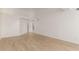 Large living room with wood floors offers a versatile and bright space at 10390 E Lakeview Dr # 204, Scottsdale, AZ 85258