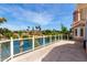 Waterfront patio with glass railings and an endless view of the beautiful mountain skyline at 10390 E Lakeview Dr # 204, Scottsdale, AZ 85258