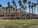 Community park featuring covered picnic areas near a beautiful lake backdrop at 10489 S 182Nd Dr, Goodyear, AZ 85338