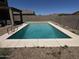 Private backyard featuring a sparkling in-ground pool, perfect for relaxation and entertainment at 10489 S 182Nd Dr, Goodyear, AZ 85338