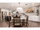 Dining room with hardwood floors, modern lighting, and ample counter space at 1060 S Florence Dr, Mesa, AZ 85208