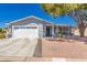 Charming single-story home featuring a two-car garage and covered front porch in a well-maintained community at 1060 S Florence Dr, Mesa, AZ 85208