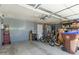 Organized garage space with storage, bicycles, and ample room for parking at 1060 S Florence Dr, Mesa, AZ 85208