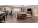 Bright open-plan living room with modern furnishings, hardwood floors, and a dining area at 1060 S Florence Dr, Mesa, AZ 85208