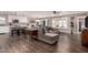Spacious open-plan living room and kitchen with hardwood floors, modern finishes and bright light at 1060 S Florence Dr, Mesa, AZ 85208