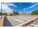 A full view of the community shuffleboard court on a clear, sunny day at 1060 S Florence Dr, Mesa, AZ 85208
