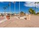 Beautiful Veteran's Memorial park with walkways, monuments, and flagpoles at 1060 S Florence Dr, Mesa, AZ 85208