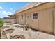 Cozy backyard with patio area, desert landscaping, and a storage shed providing a private and functional outdoor setting at 10601 W Hutton Dr, Sun City, AZ 85351