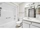 Bathroom featuring a shower-tub combo and vanity at 10601 W Hutton Dr, Sun City, AZ 85351