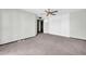 Spacious bedroom offering ample closet space, plush carpeting, and natural lighting at 10601 W Hutton Dr, Sun City, AZ 85351