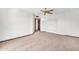Neutral bedroom with closet storage and carpet at 10601 W Hutton Dr, Sun City, AZ 85351