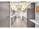 Efficient kitchen showcasing modern appliances, functional layout, and ample storage for culinary convenience at 10601 W Hutton Dr, Sun City, AZ 85351