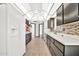 Spacious eat-in kitchen includes modern appliances, ample storage, and tile flooring at 10601 W Hutton Dr, Sun City, AZ 85351