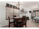 Inviting breakfast nook featuring a round table, four chairs, and natural light at 11591 W Jefferson St, Avondale, AZ 85323