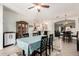 Open dining area with natural light, a view into the kitchen and living spaces at 11591 W Jefferson St, Avondale, AZ 85323
