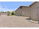 Backyard space with gravel, mature landscaping and block fencing at 1182 E Canyon Way, Chandler, AZ 85249