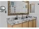 Bathroom featuring double sinks and large vanity at 1182 E Canyon Way, Chandler, AZ 85249