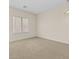 Neutral bedroom with neutral carpet, window with blinds, and modern light fixture at 1182 E Canyon Way, Chandler, AZ 85249
