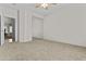 This carpeted bedroom has a sliding-door closet and a ceiling fan at 1182 E Canyon Way, Chandler, AZ 85249