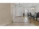 Grand foyer with decorative tile flooring leading into an adjacent dining room at 1182 E Canyon Way, Chandler, AZ 85249
