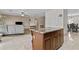 Open kitchen featuring granite island and connection to the living spaces at 1182 E Canyon Way, Chandler, AZ 85249