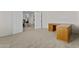 Carpeted office space with an wooden desk and views into other rooms at 1182 E Canyon Way, Chandler, AZ 85249