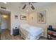 Comfortable bedroom with a ceiling fan, natural light, and a calming ambiance at 12154 S Ki Rd, Phoenix, AZ 85044