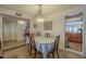 Cozy dining room with a chandelier, adjacent to other living areas and the kitchen at 12154 S Ki Rd, Phoenix, AZ 85044