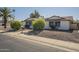 Charming single-story home featuring mature landscaping and a well-maintained front yard at 12154 S Ki Rd, Phoenix, AZ 85044