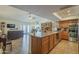 Open kitchen seamlessly connected to the dining and living areas, ideal for entertaining and Gathering gatherings at 12154 S Ki Rd, Phoenix, AZ 85044
