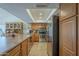 This kitchen is equipped with stainless steel appliances, ample counter space, and bright lighting, perfect for cooking at 12154 S Ki Rd, Phoenix, AZ 85044