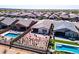Aerial view of backyard featuring a pool, desert landscaping, and patio at 12538 E Pivot Peak --, Gold Canyon, AZ 85118