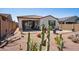 View of desert landscaping and covered patio from the backyard at 12538 E Pivot Peak --, Gold Canyon, AZ 85118