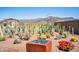 View of desert landscaping and water feature in the backyard at 12538 E Pivot Peak --, Gold Canyon, AZ 85118