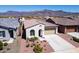 Charming single-story home featuring desert landscaping and a two-car garage at 12538 E Pivot Peak --, Gold Canyon, AZ 85118