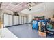 Spacious garage with ample storage cabinets and epoxy floors at 12538 E Pivot Peak --, Gold Canyon, AZ 85118