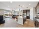Open-concept kitchen featuring a large island and modern stainless steel appliances at 12538 E Pivot Peak --, Gold Canyon, AZ 85118