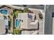 Aerial view of a home showcasing the tiled roof, pool, and desert landscaping at 1413 E San Remo Ave, Gilbert, AZ 85234